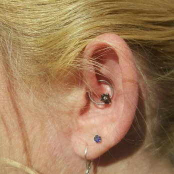 Unique Daith Piercing On Girl Left Ear