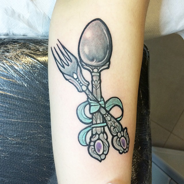 Very Beautiful Vintage Spoon And Fork Tied Tattoo On Arm Sleeve