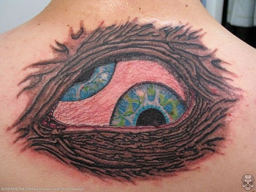 Very Nice Evil Eye Tattoo On Upper Back