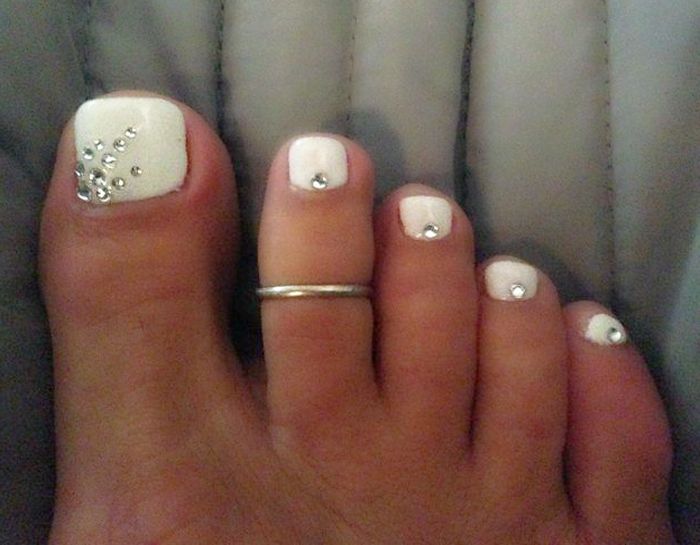White Toe Nails With Rhinestones Design Idea