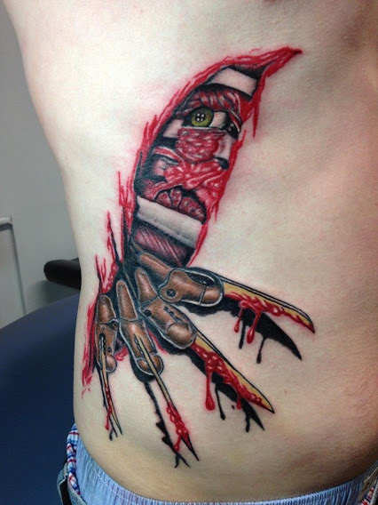 Wonderful 3D Freddy Krueger Glove Ripped Skin Tattoo On Side Rib