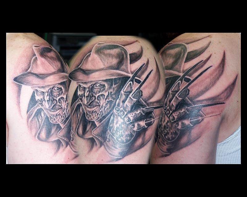 Wonderful Grey Ink Freddy Krueger Horror Tattoo On Left Shoulder