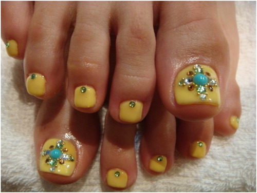 Yellow Toe Nail Art With Rhinestones Design Idea
