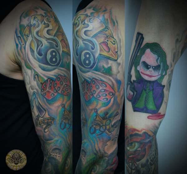 Amazing Jester With Dice And Ball Colorful Tattoo On Left Full Sleeve