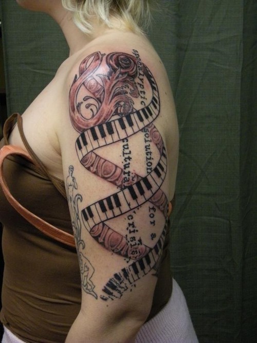 Amazing Piano Keys Tattoo On Left Half Sleeve