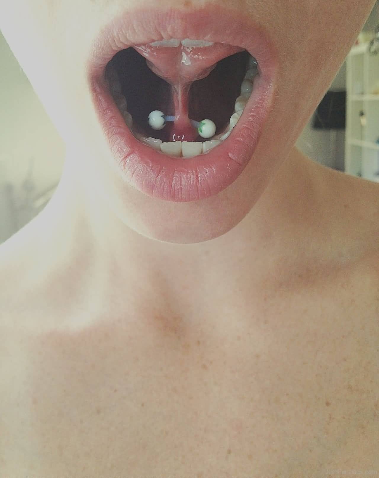 Amazing Tongue Frenulum Piercing With White Barbell