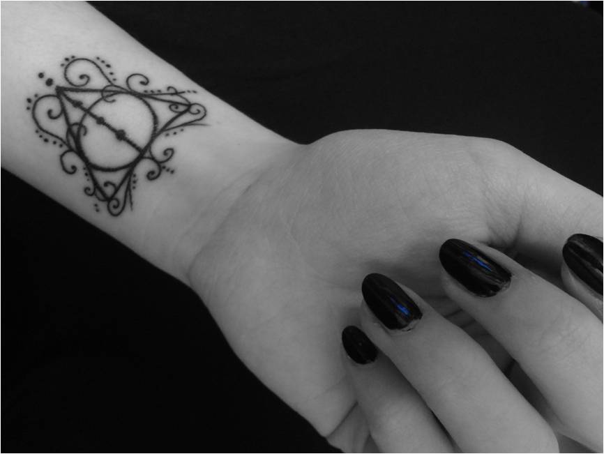 Attractive Deathly Hallows Wrist Tattoo For Girls