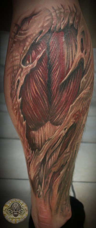 Attractive Muscles Back Leg Tattoo