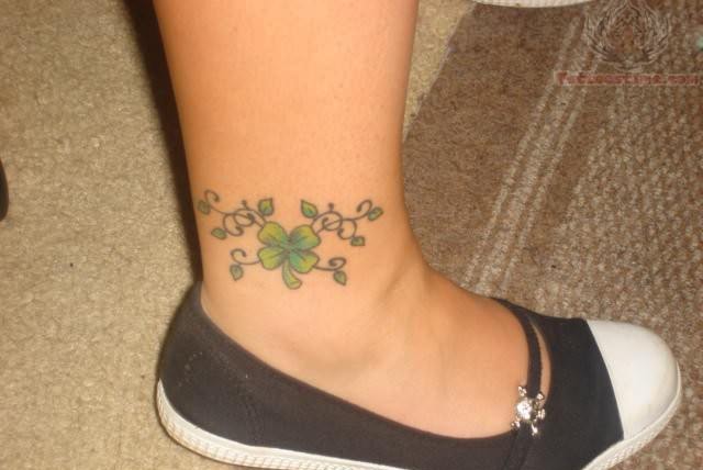 Attractive Small Four Leaf Shamrock Tattoo On Ankle