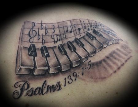 Awesome Black And Grey 3D Piano Keys Tattoo