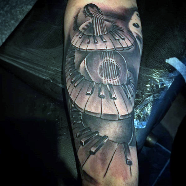 Awesome Black Spiral Piano Keys And Guitar Tattoo On Arm
