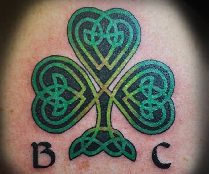 Awesome Celtic Style Shamrock With Letters Tattoo