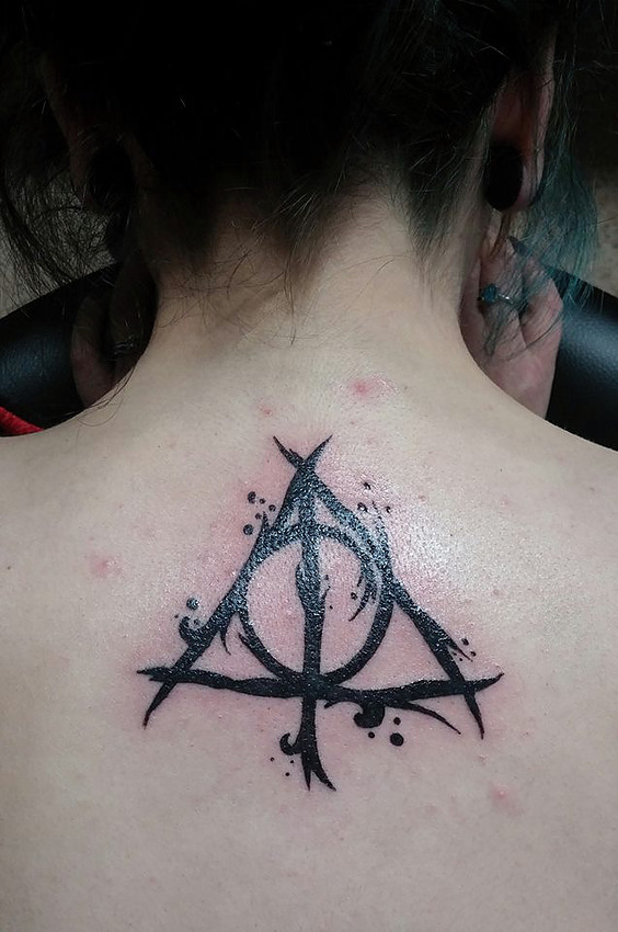 Awesome Deathly Hallows Tattoo On Upper Back