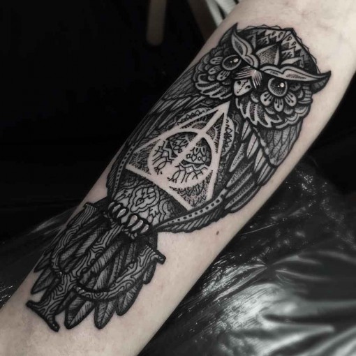 Awesome Grey Hallows Owl Tattoo On Forearm