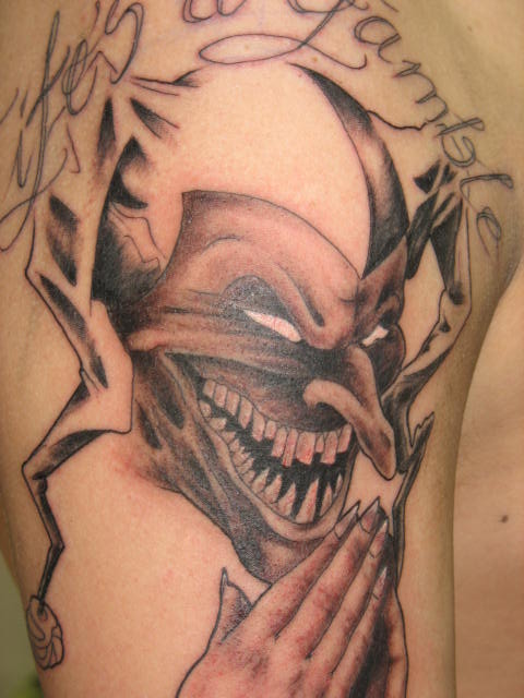 Awesome Grey Ink Evil Jester Holding Hands Tattoo On Right Half Sleeve