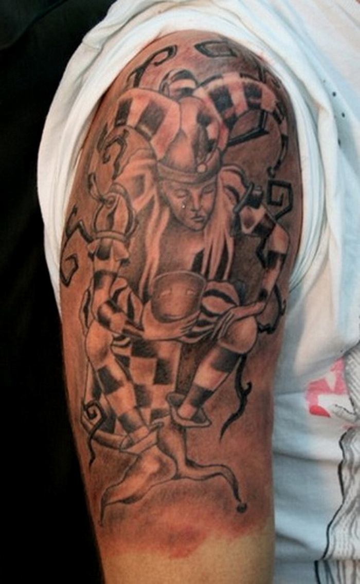 Awesome Grey Ink Jester Tattoo On Right Half Sleeve