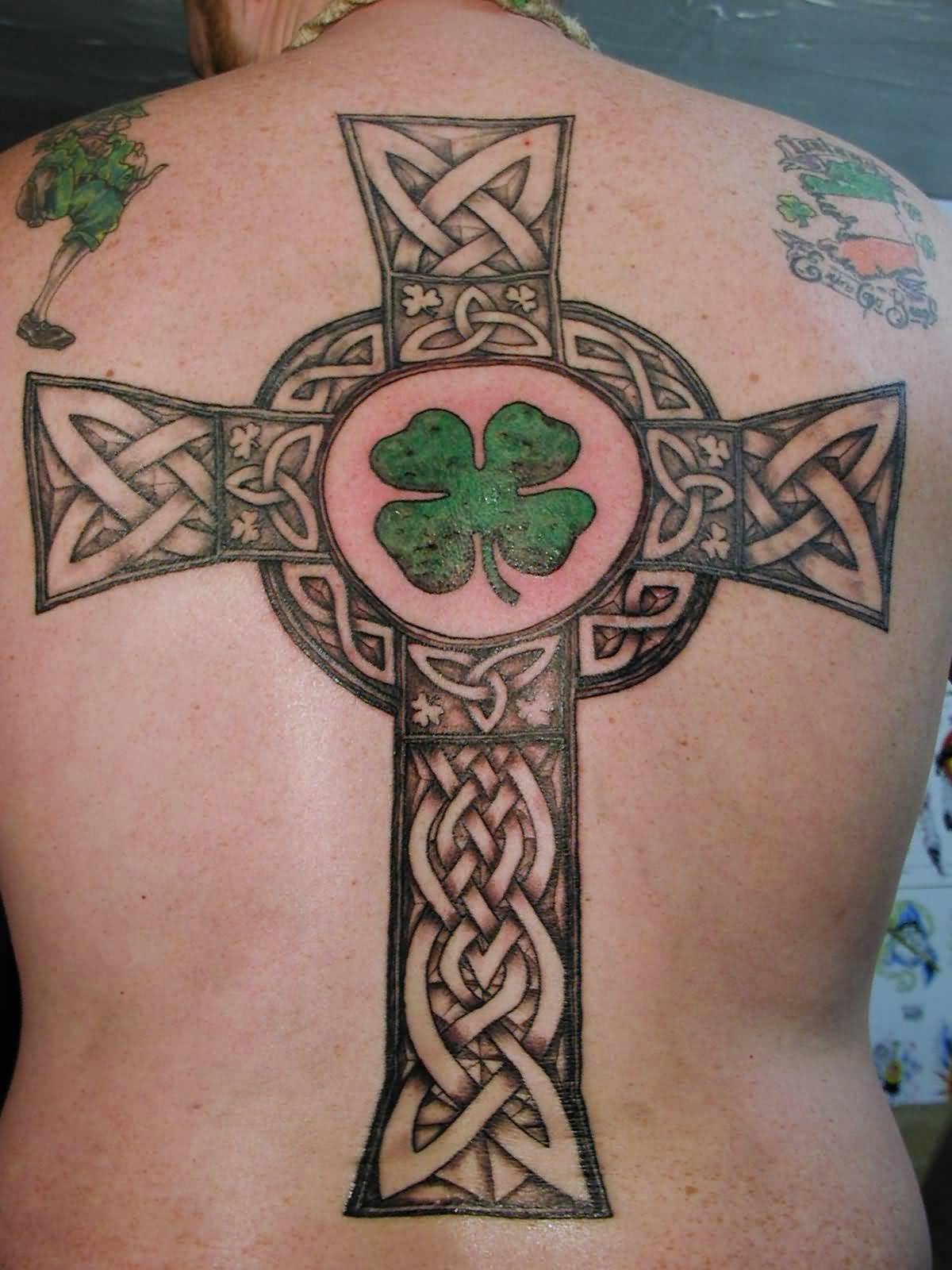 Awesome Large Celtic Cross And Four Leaf Shamrock Tattoo On Full Back