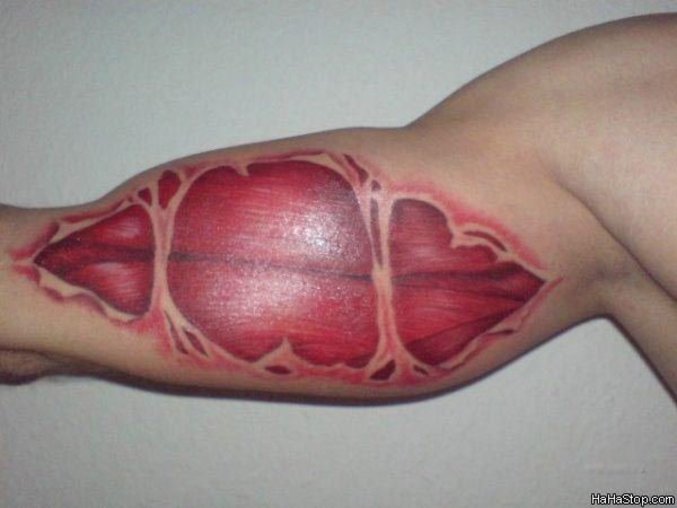 Awesome Muscles Tattoo On Biceps