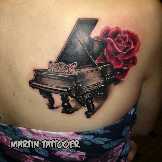 Awesome Red Rose And Grand Piano Tattoo On Back Shoulder