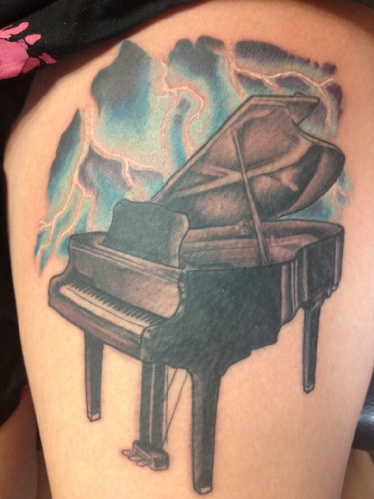 Awful Grey Grand Piano Tattoo On Left Thigh