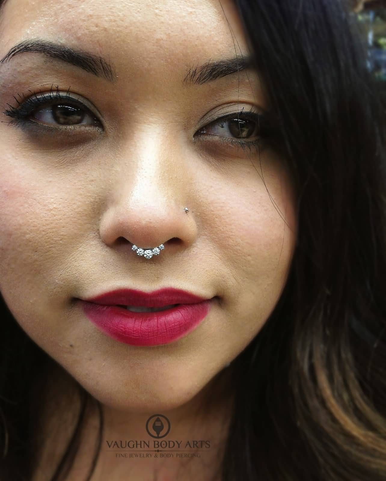 Beautiful Girl With Left Nostril And Septum Piercing
