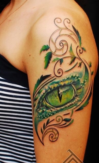 Beautiful Green Reptile Eye With Patterns Tattoo On Left Shoulder