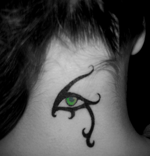 Beautiful Horus Eye With Green Eyeball Tattoo On Back Neck