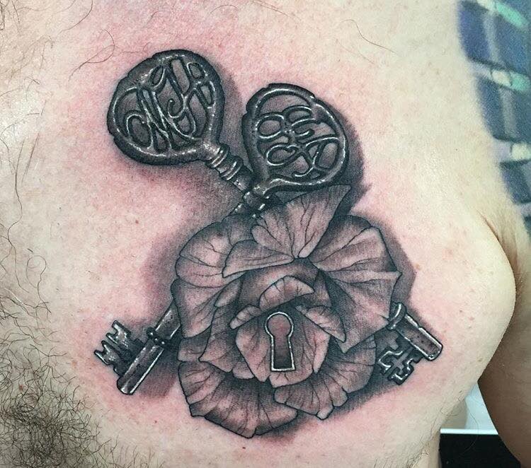 Beautiful Lock Rose With Keys Tattoo On Man Chest