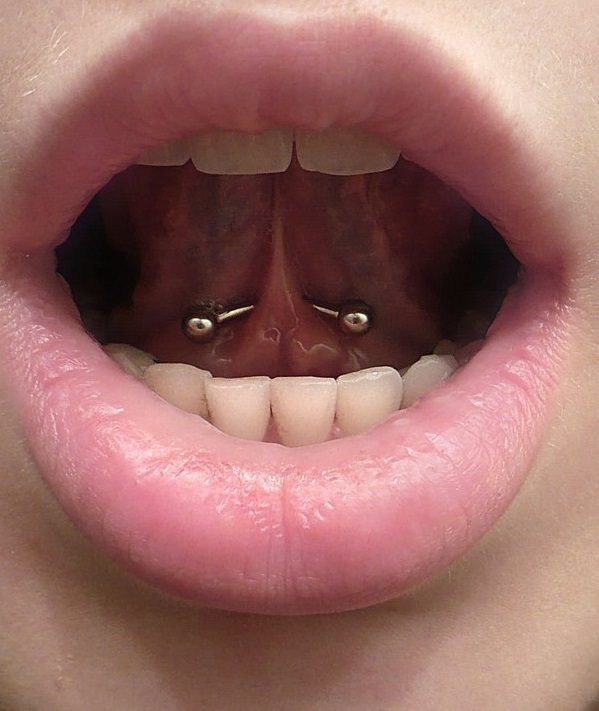 Beautiful Tongue Frenulum Piercing With Curved Silver Barbell