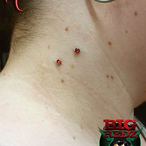 Beautiful Vampire Bite Piercing With Red Anchors