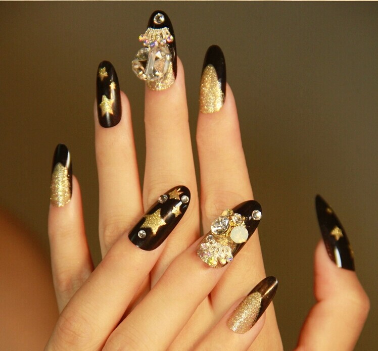 Black And Gold Beautiful Stiletto Nail Art