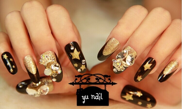 Black And Gold Bling Stiletto Nail Art