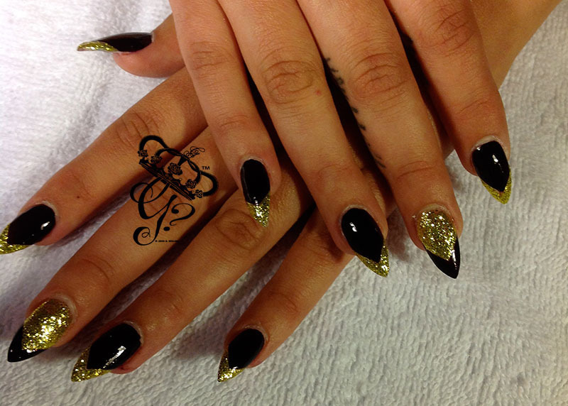 Black And Gold Glitter Stiletto Nail Art Design Idea