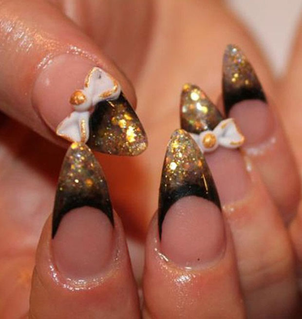 Black And Gold Glitter Stiletto Nails With White 3d Bow Design