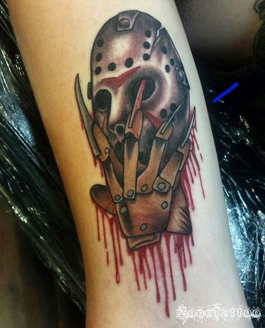 Black And Grey Jason Mask With Freddy Glove Tattoo