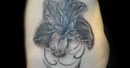 Black And Grey Small Iris Tattoo