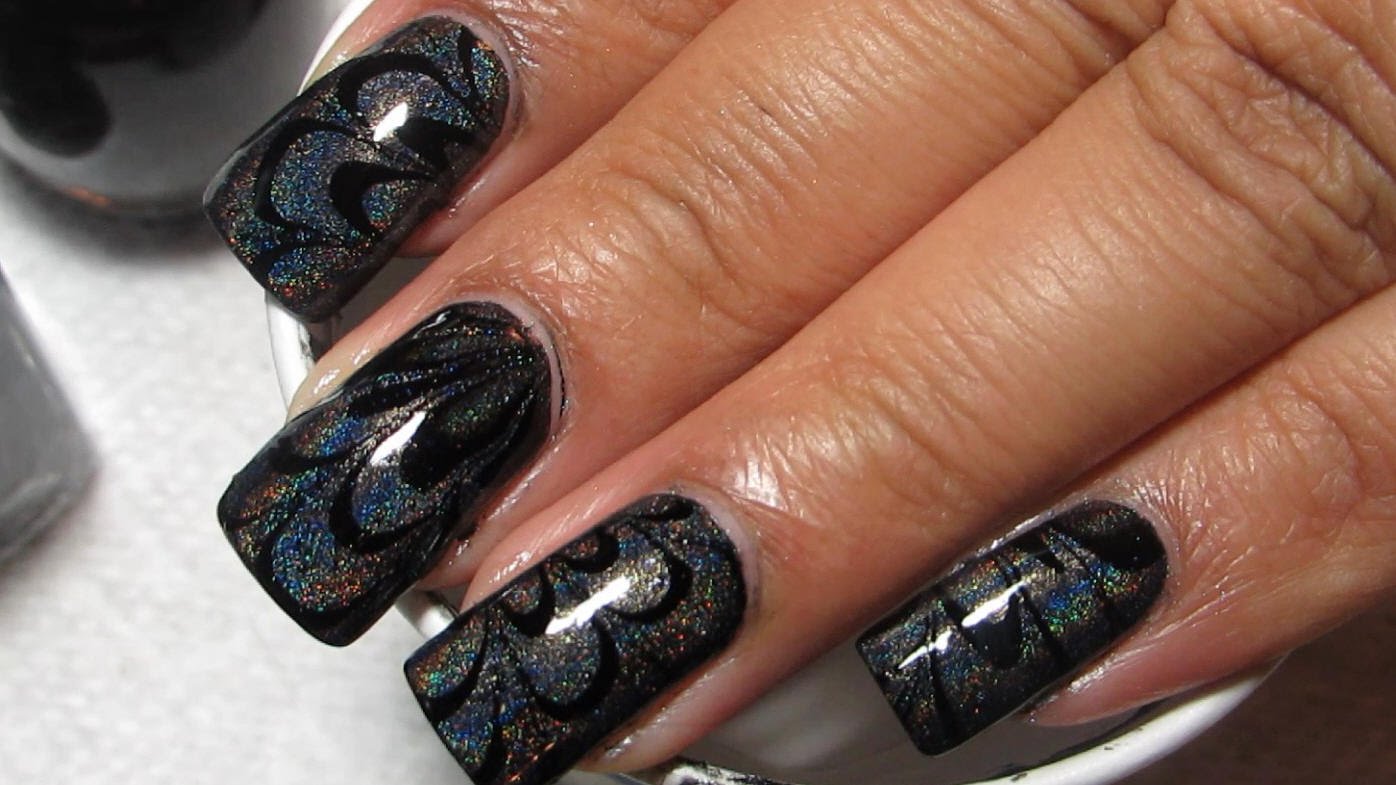 Black And Holographic Water Marble Nail Art Design
