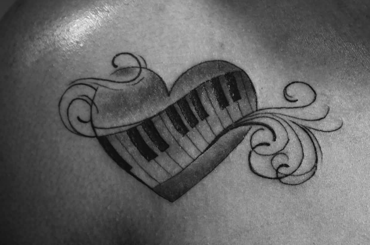 Black And White Piano Keys In Heart Tattoo