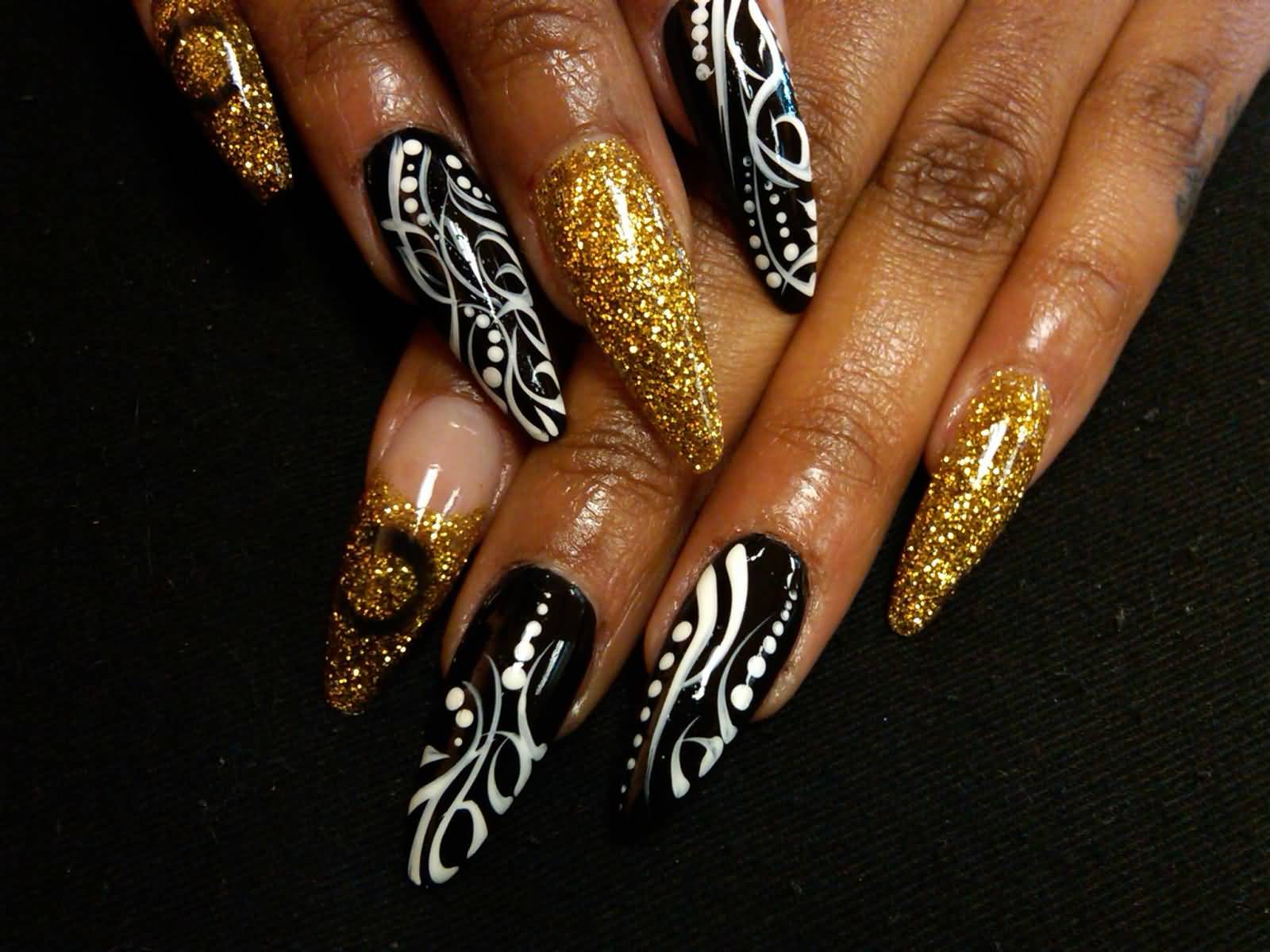 Black And White Stripes Design With Gold Glitter Stiletto Nail Art