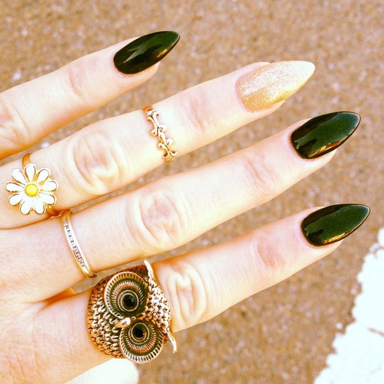 Black Glossy And Gold Accent Stiletto Nail Art