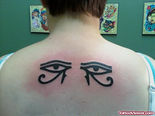 Black Ink Horus Eyes Tattoo On Upper Back