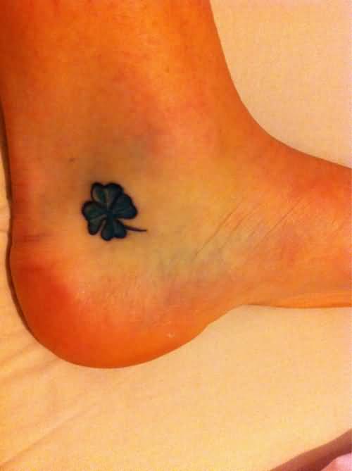 Black Ink Shamrock Tattoo On Ankle