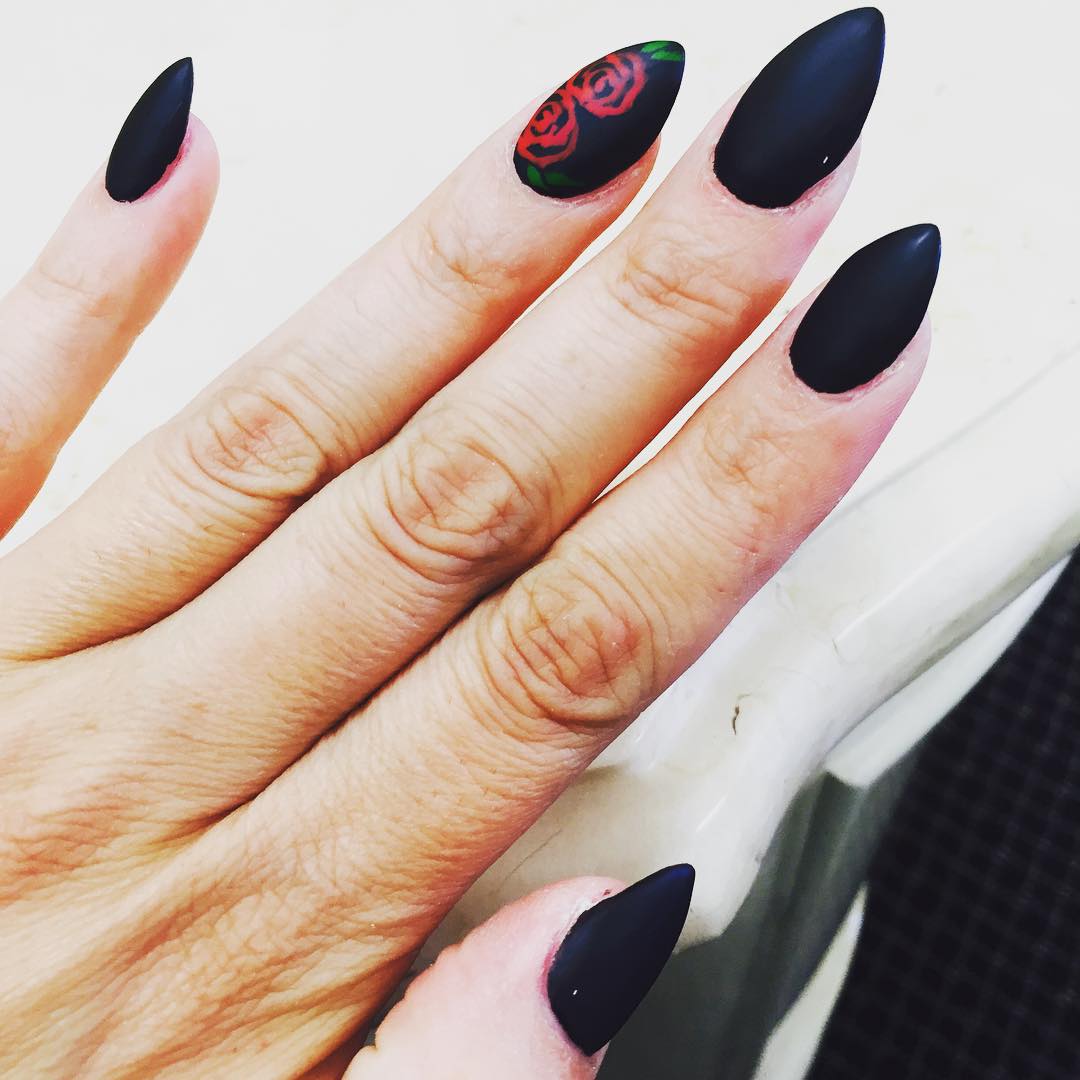 Black Matte Stiletto Nail Art With Accent Red Rose Flower Design