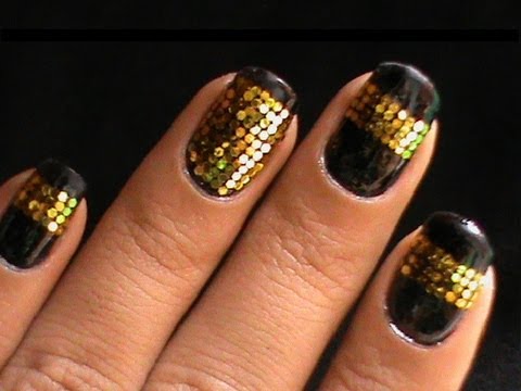 Black Nails With Gold Glitter Nail Art Design Idea