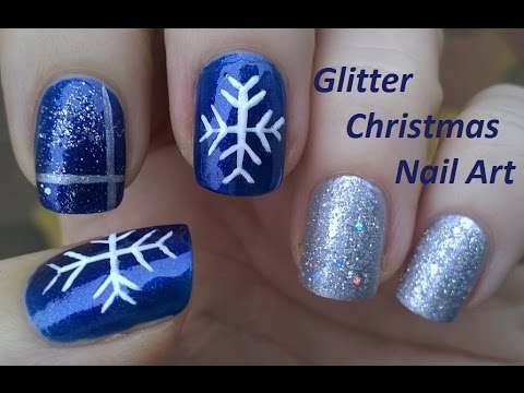 Blue And Silver Sparkle With White Snowflakes Design Nail Art