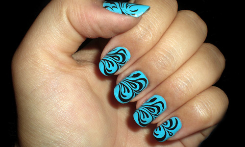 Blue Base Nails With Black Floral Design Idea