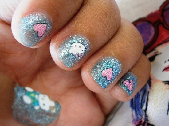 Blue Glitter Nail Art With Hello Kitty And Heart Design