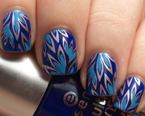 Blue Nails With Floral Design Nail Art