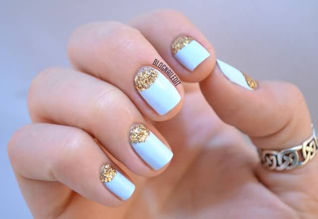 Blue Nails With Half Moon Gold Glitter Nail Art