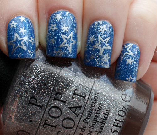 Blue Nails With Silver Stars Design Nail Art
